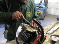 JIM_PUTTING_CHAINSAW_BACK_TOGETHER_CS-2