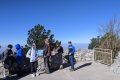 Students and adults enjoy the view from Sandia Crest
