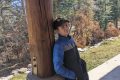 Student listening at Capulin shelter