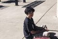 Student listening at Capulin shelter