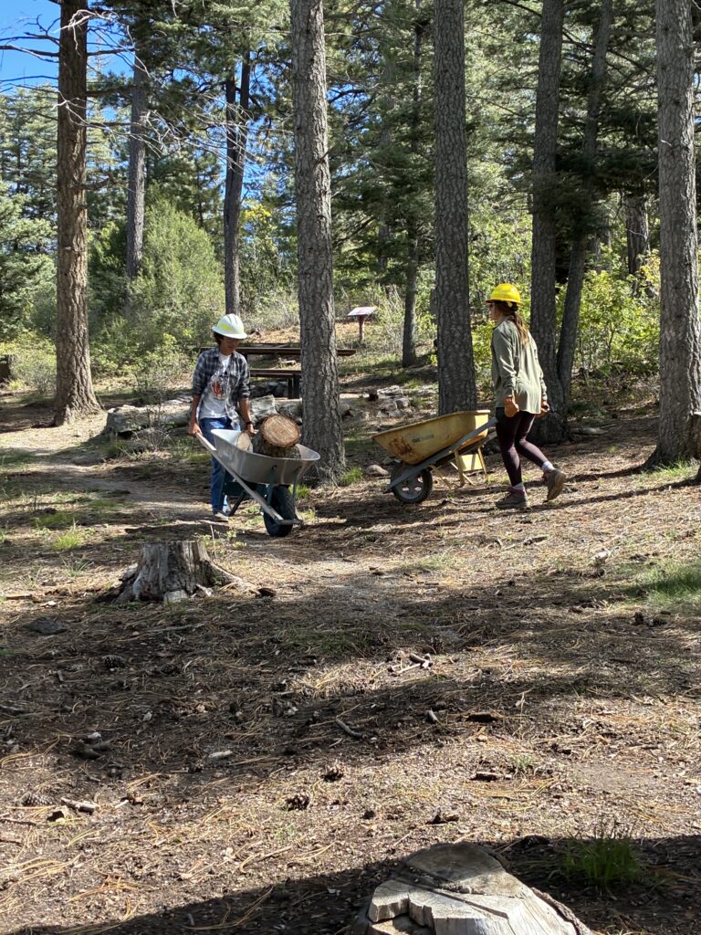 20261007 1254 Students hauling last of rounds to trailer